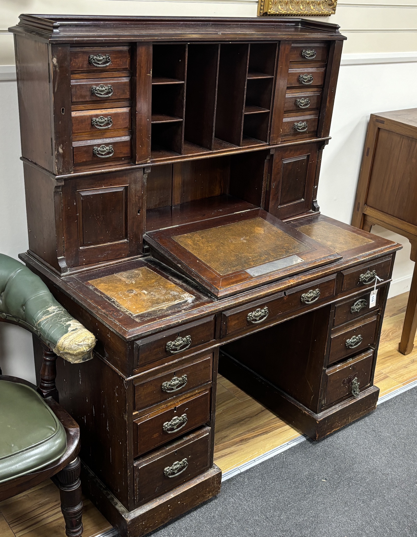 A late Victorian mahogany pedestal desk, width 118cm, depth 65cm, height 148cm, Provenance: Pickersgill, Labour MP and an associated late Victorian mahogany office elbow chair, provenance as above